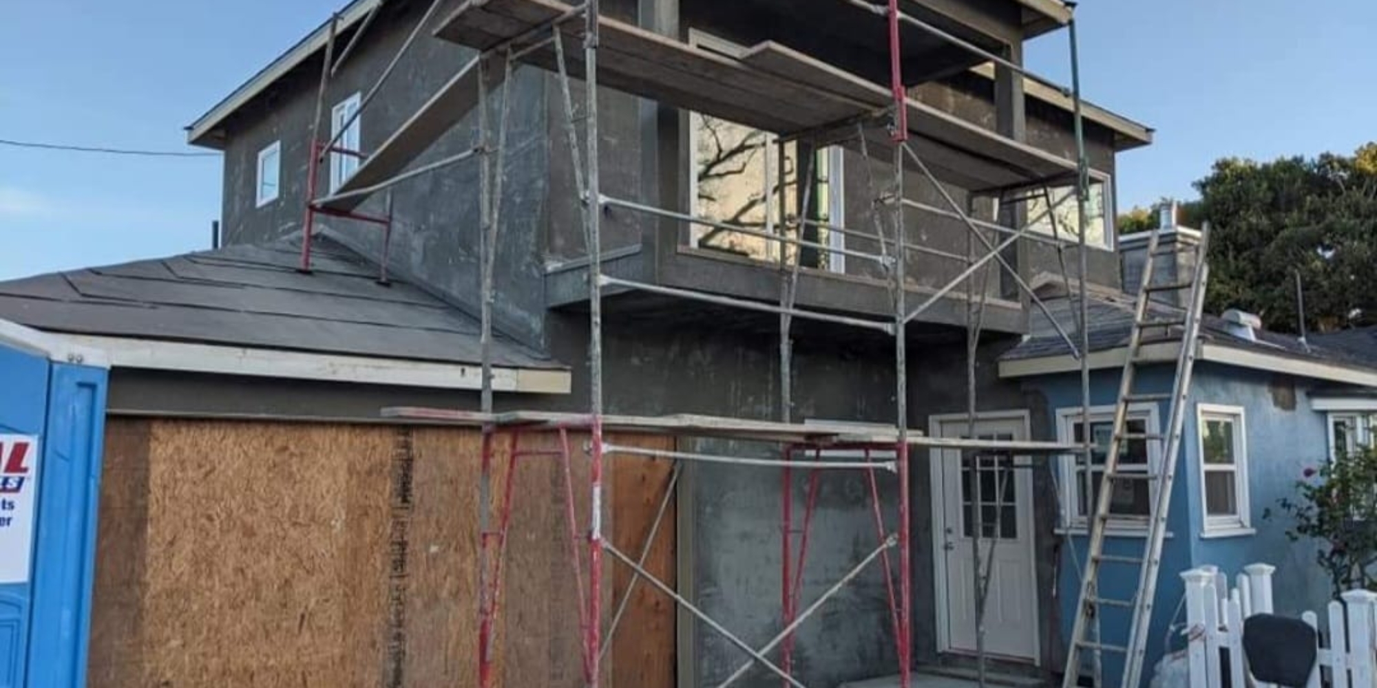 Encino Project — residential house under construction with scaffolding